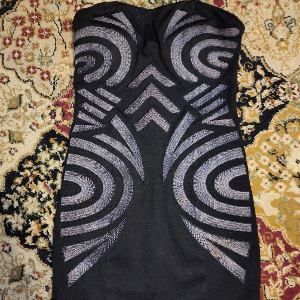 NIKIBIKI black dress with sexy design